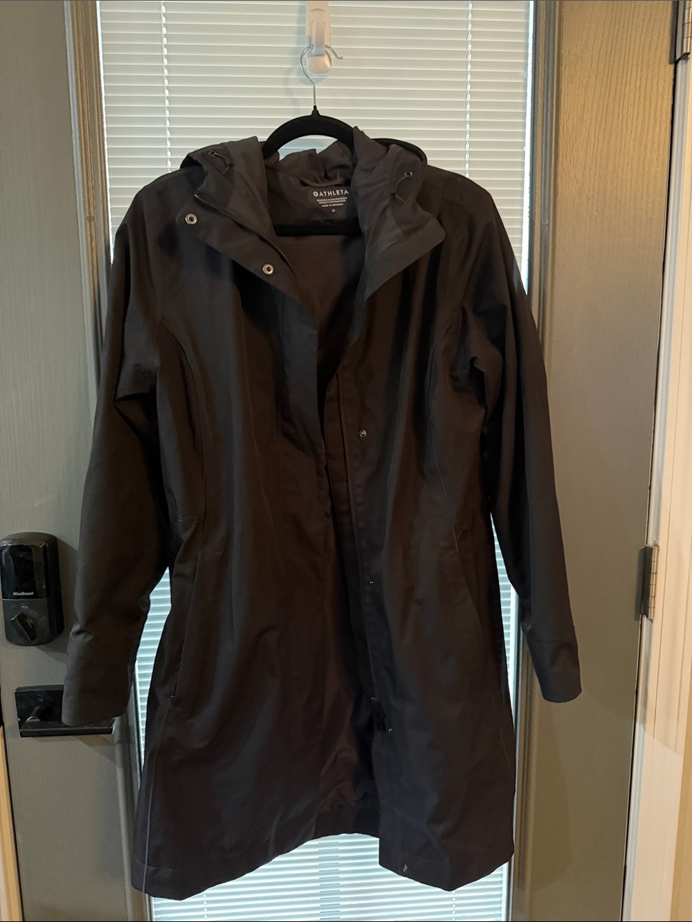 Athleta Black Hooded Raincoat with Streamlined Silhouette